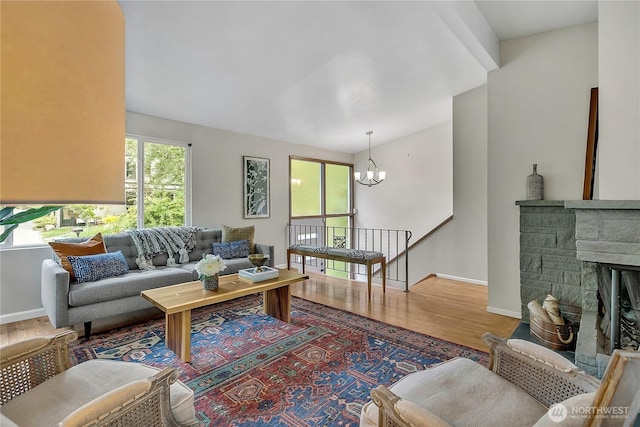 4815 46th Ave S, Seattle, WA 98118 - living area featuring a chandelier and wood finished floors