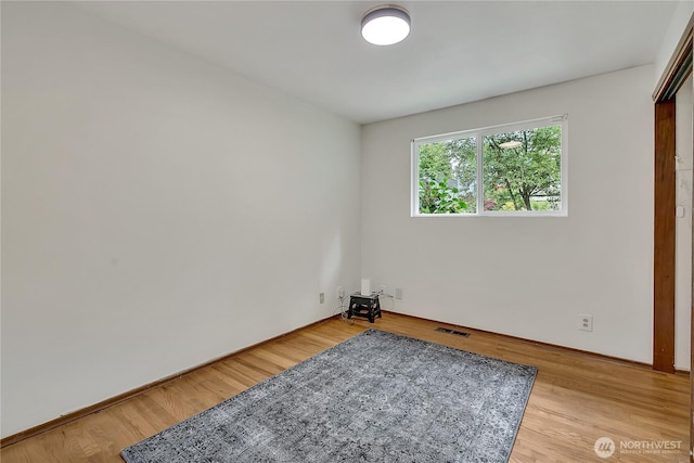 4815 46th Ave S, Seattle, WA 98118 - unfurnished bedroom with light wood finished floors