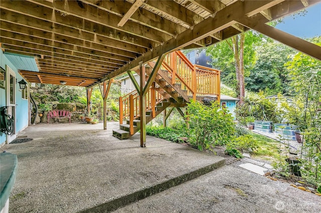 4815 46th Ave S, Seattle, WA 98118 - view of patio featuring stairs and a wooden deck