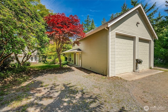 2285 Rusty Ln, Bellingham, WA 98229 - view of property exterior featuring a garage and an outbuilding