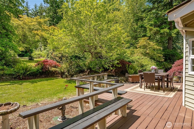 2285 Rusty Ln, Bellingham, WA 98229 - wooden deck featuring outdoor dining area and a lawn