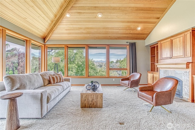 423 Lombard Ln, Wenatchee, WA 98801 - carpeted living room featuring lofted ceiling, wood ceiling, and a fireplace