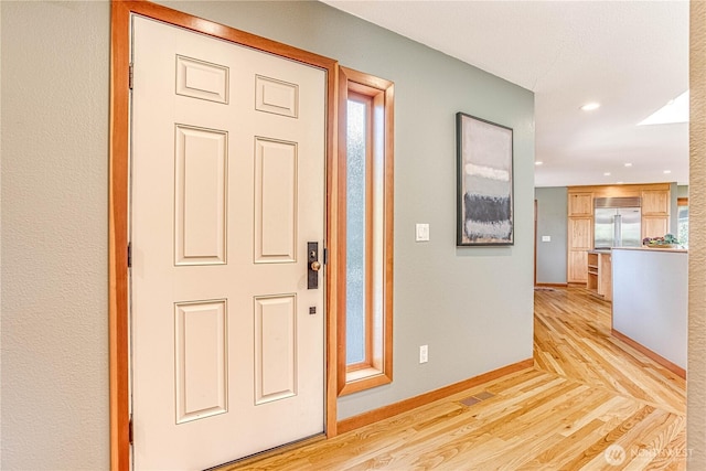 423 Lombard Ln, Wenatchee, WA 98801 - foyer entrance with light wood-style floors and recessed lighting