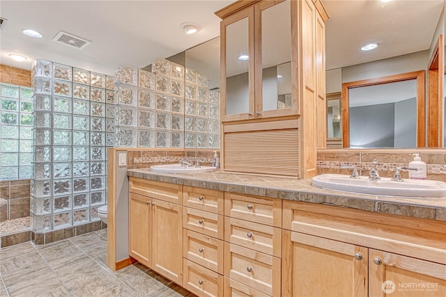 423 Lombard Ln, Wenatchee, WA 98801 - full bath with double vanity, walk in shower, and tasteful backsplash