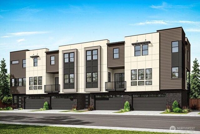 18814 99th Ct NE Unit A, Bothell, WA 98011 - townhome / multi-family property with an attached garage and brick siding