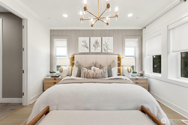 18814 99th Ct NE Unit A, Bothell, WA 98011 - bedroom featuring a chandelier, multiple windows, recessed lighting, wood finished floors, and ornamental molding