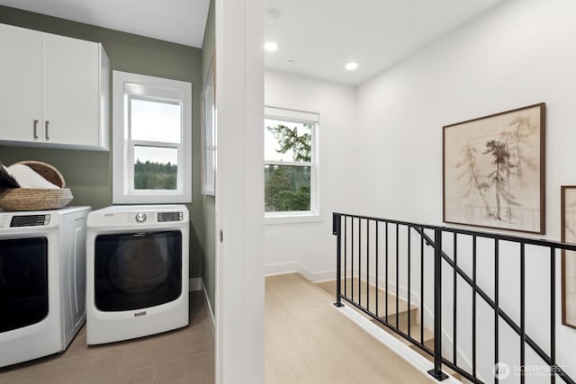 18814 99th Ct NE Unit A, Bothell, WA 98011 - laundry room featuring cabinet space, washer and dryer, and recessed lighting