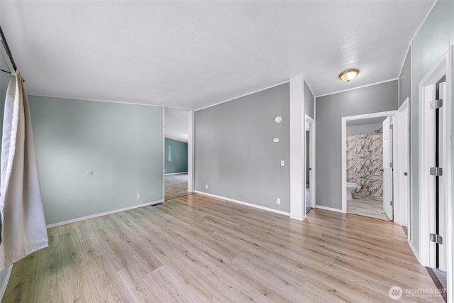 700 N Reed St Unit 101, Sedro Woolley, WA 98284 - spare room featuring light wood-type flooring and baseboards