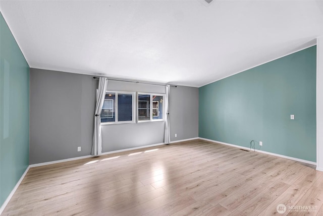 700 N Reed St Unit 101, Sedro Woolley, WA 98284 - empty room with wood finished floors and baseboards