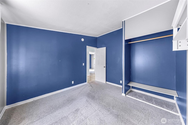 700 N Reed St Unit 101, Sedro Woolley, WA 98284 - unfurnished bedroom with carpet flooring and baseboards