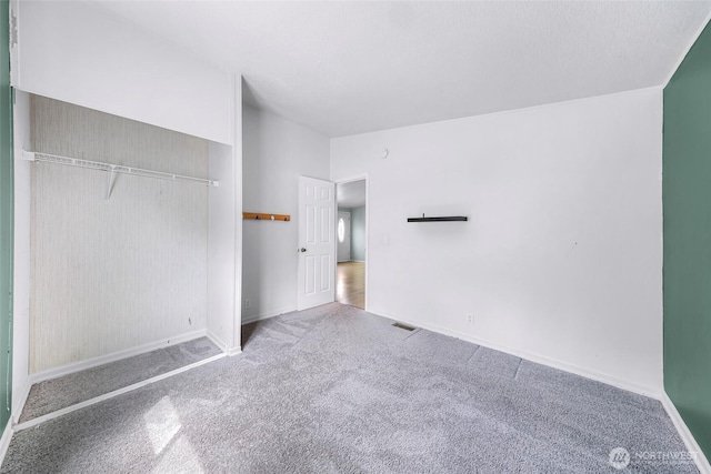 700 N Reed St Unit 101, Sedro Woolley, WA 98284 - unfurnished bedroom featuring carpet flooring and a closet
