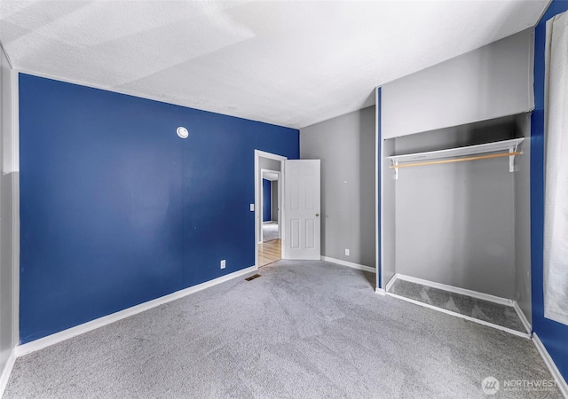 700 N Reed St Unit 101, Sedro Woolley, WA 98284 - unfurnished bedroom featuring carpet and a closet