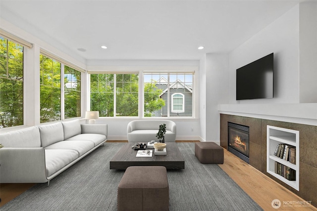 424 3rd Ln S Unit 12, Kirkland, WA 98033 - living room with wood finished floors, a fireplace, and recessed lighting