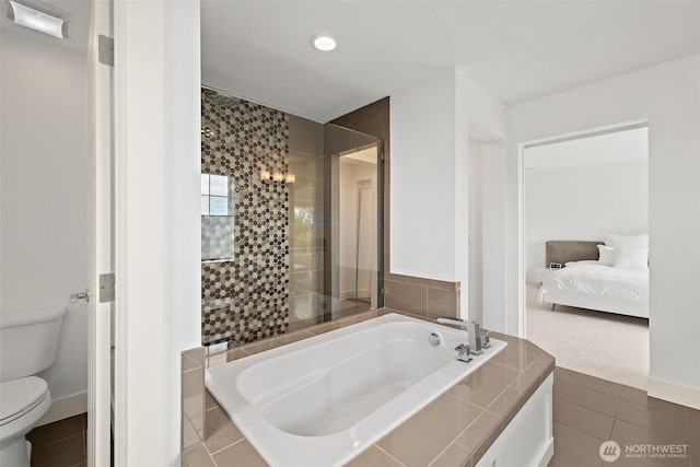 424 3rd Ln S Unit 12, Kirkland, WA 98033 - bathroom with a bath, ensuite bathroom, tile patterned floors, recessed lighting, and tiled shower