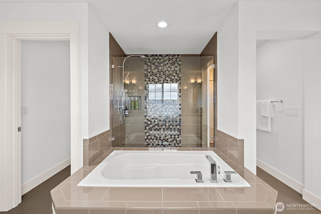 424 3rd Ln S Unit 12, Kirkland, WA 98033 - bathroom featuring a bath and a stall shower