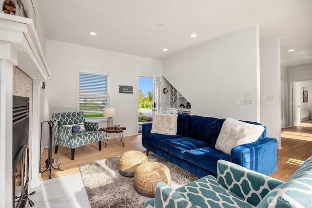 493 N Beach Dr, Port Ludlow, WA 98365 - living room with light wood-style flooring, recessed lighting, and a fireplace