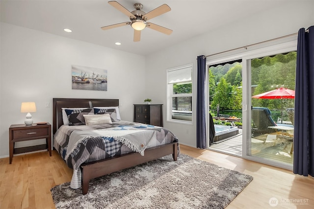 493 N Beach Dr, Port Ludlow, WA 98365 - bedroom with access to outside, light wood-type flooring, recessed lighting, and ceiling fan