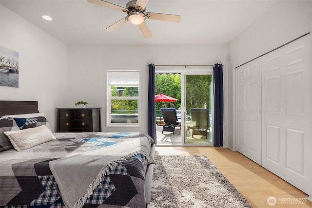 493 N Beach Dr, Port Ludlow, WA 98365 - bedroom with access to outside, light wood-style flooring, ceiling fan, recessed lighting, and a closet