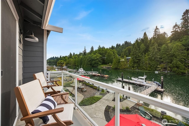 493 N Beach Dr, Port Ludlow, WA 98365 - balcony with a water view, a forest view, and a dock