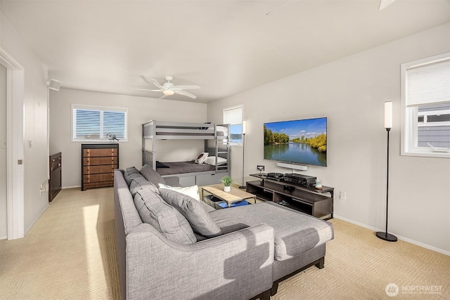 493 N Beach Dr, Port Ludlow, WA 98365 - bedroom with light carpet and a ceiling fan