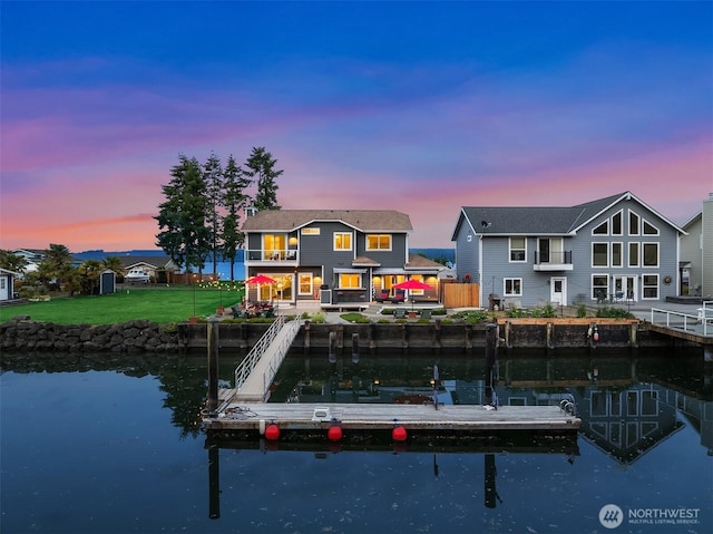 493 N Beach Dr, Port Ludlow, WA 98365 - dock featuring a water view, a balcony, and a patio