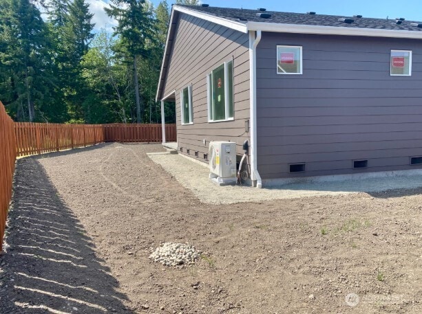 2602 Acer Loop SE, Lacey, WA 98513 - view of property exterior with crawl space and a fenced backyard