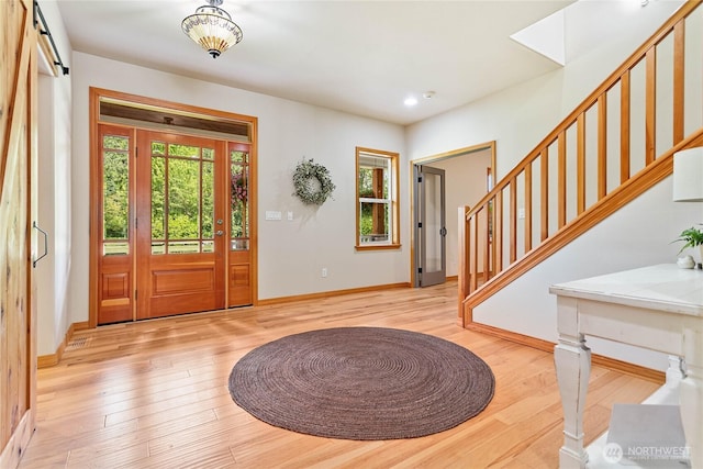 6068 E Hemmi Ln, Bellingham, WA 98226 - foyer entrance featuring plenty of natural light, stairs, light wood-style flooring, and recessed lighting