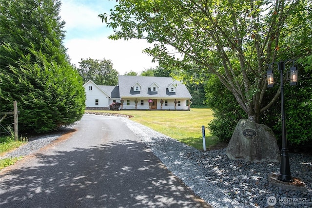 6068 E Hemmi Ln, Bellingham, WA 98226 - new england style home with a front yard and asphalt driveway