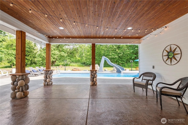 6068 E Hemmi Ln, Bellingham, WA 98226 - view of patio / terrace with an outdoor pool