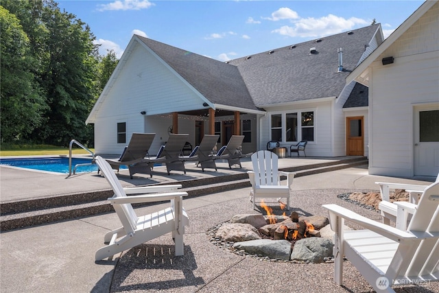 6068 E Hemmi Ln, Bellingham, WA 98226 - view of patio / terrace with an outdoor fire pit and an outdoor pool