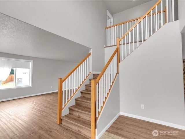 7335 33rd Ave NE, Lacey, WA 98516 - stairs with wood finished floors and baseboards