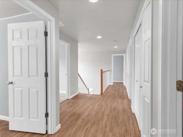 7335 33rd Ave NE, Lacey, WA 98516 - hallway featuring an upstairs landing, light wood-style flooring, and recessed lighting