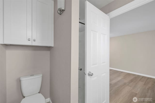 1229 SW 146th, Seahurst, WA 98168 - bathroom featuring wood finished floors and toilet