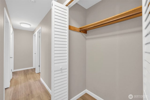 1229 SW 146th, Seahurst, WA 98168 - spacious closet featuring light wood finished floors