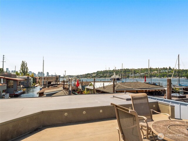 2727 Fairview Ave E Unit 12, Seattle, WA 98102 - patio / terrace featuring a water view