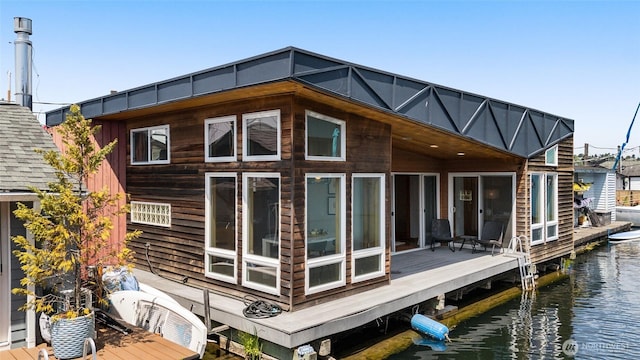 2727 Fairview Ave E Unit 12, Seattle, WA 98102 - rear view of house featuring a water view
