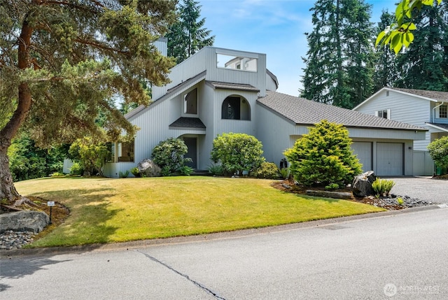 2314 140th Pl SE, Mill Creek, WA 98012 - view of front of home featuring a garage, a front lawn, and asphalt driveway