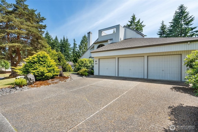 2314 140th Pl SE, Mill Creek, WA 98012 - view of property exterior with driveway and a garage
