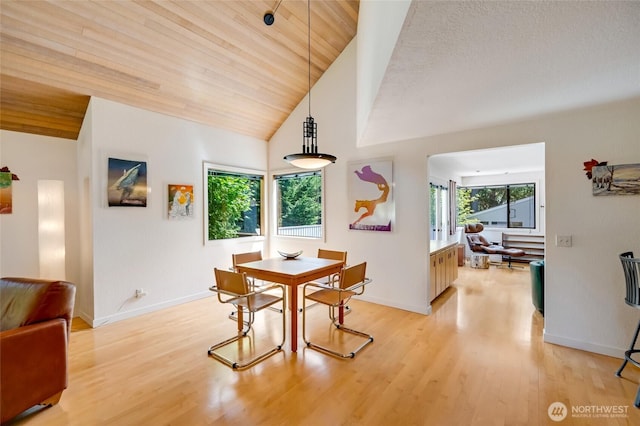 2314 140th Pl SE, Mill Creek, WA 98012 - dining area featuring vaulted ceiling, light wood finished floors, and wood ceiling