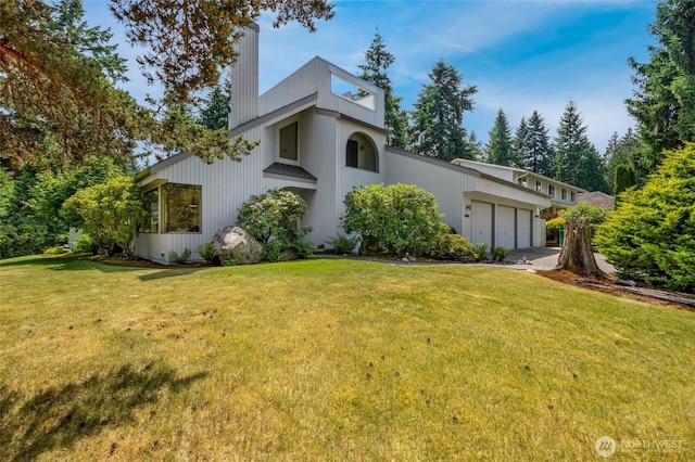 2314 140th Pl SE, Mill Creek, WA 98012 - view of front facade featuring an attached garage and a front lawn