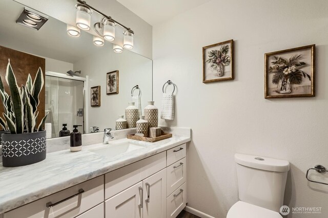 3434 25th Ave W Unit 101, Seattle, WA 98199 - bathroom with vanity and a shower stall