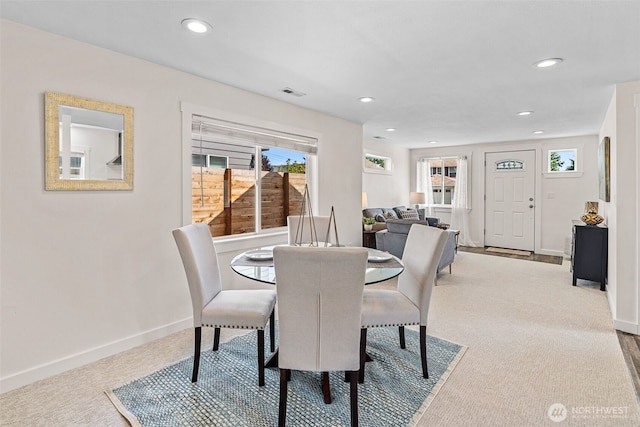 1040 S Director St Unit A, Seattle, WA 98108 - carpeted dining area with baseboards and recessed lighting