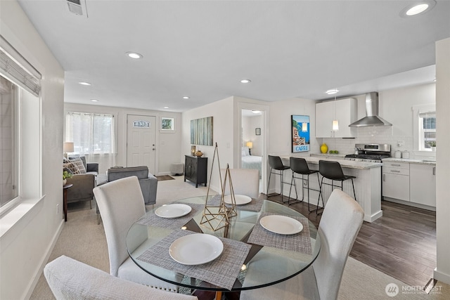 1040 S Director St Unit A, Seattle, WA 98108 - dining room featuring recessed lighting and wood finished floors