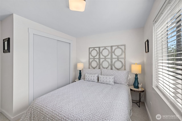 1040 S Director St Unit A, Seattle, WA 98108 - carpeted bedroom featuring baseboards and a closet