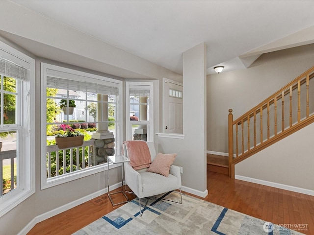 3218 189th St SE, Bothell, WA 98012 - sitting room with plenty of natural light, wood finished floors, and stairway