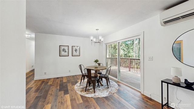 5169 Banner Rd SE, Port Orchard, WA 98367 - dining room with a wall mounted air conditioner, dark wood-type flooring, and a chandelier