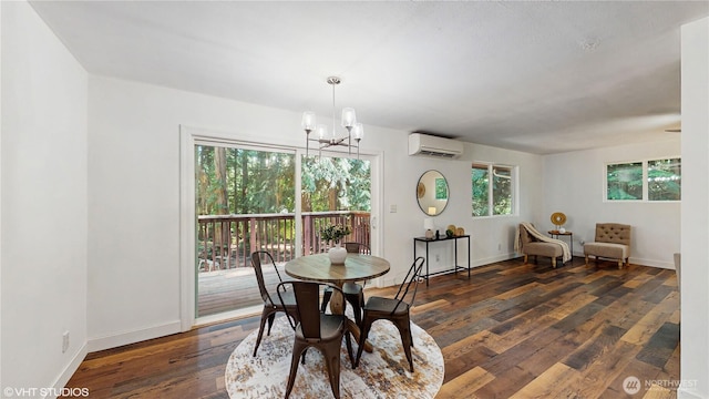 5169 Banner Rd SE, Port Orchard, WA 98367 - dining space featuring a wall mounted air conditioner, dark wood-style floors, and a chandelier