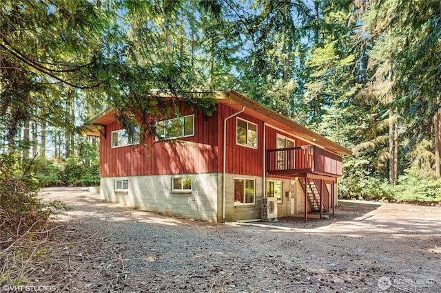 5169 Banner Rd SE, Port Orchard, WA 98367 - view of front of house featuring stairway and a deck