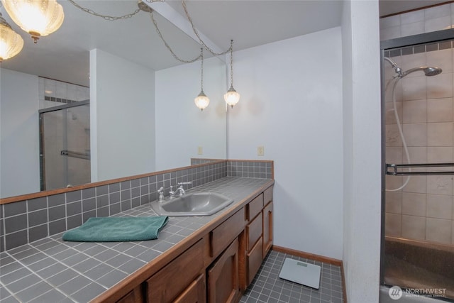 213 Monte Elma Rd, Montesano, WA 98563 - bathroom with an enclosed shower, vanity, and tile patterned flooring