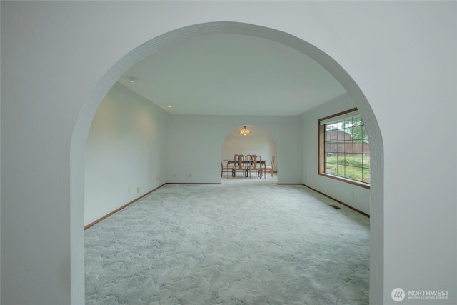 213 Monte Elma Rd, Montesano, WA 98563 - carpeted spare room featuring arched walkways and baseboards